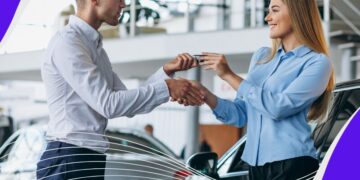 How to buy a car in Australia? 1 buy a car: customer-making-a-purchase-in-a-car-showroom